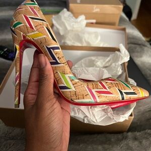 Never worn cork Christian Louboutin So Kate. Sealed to prevent water damage